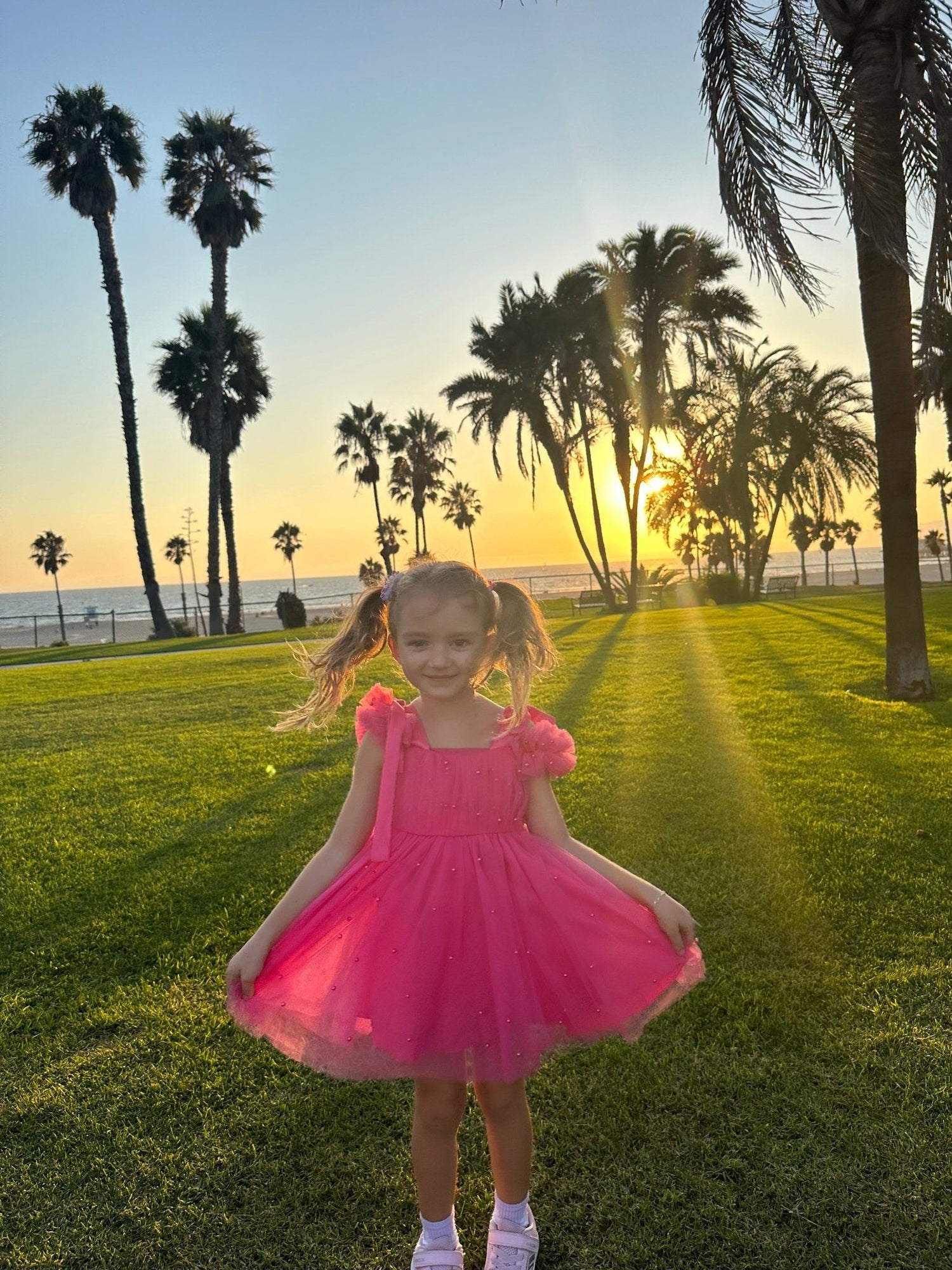 Pinky fluffy dress with pearl design
